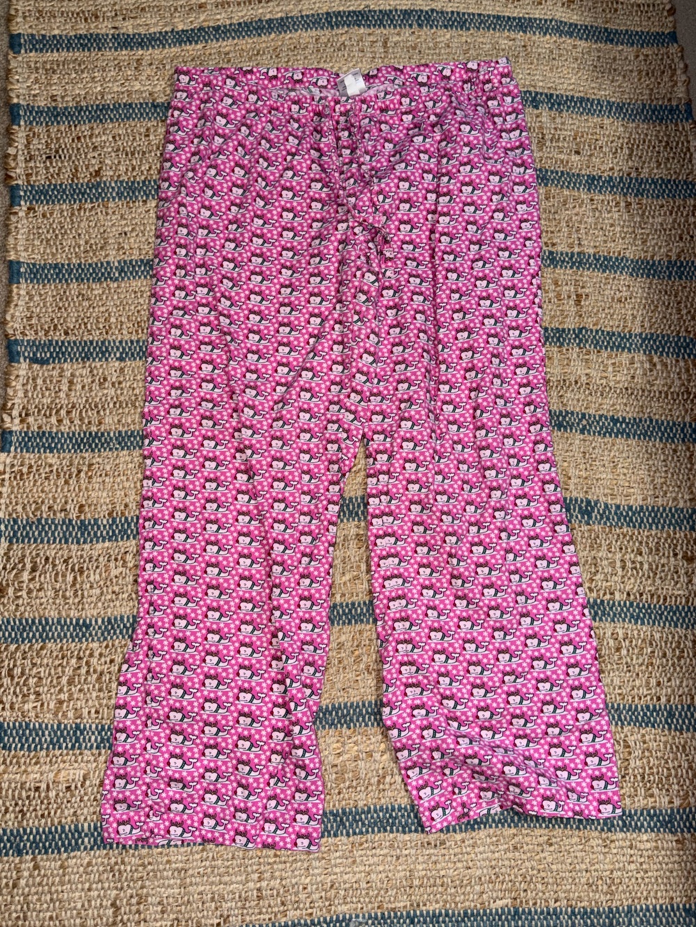 Vineyard Vines pajama pants feature a festive holiday pattern